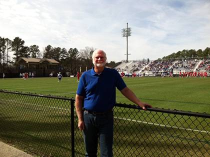 Bruce Cunningham poses during a Duke lacrosse game. Cunningham is an avid Duke sports fan and he also roots for the Buffalo Bills. Photo courtesy of Bruce Cunningham.