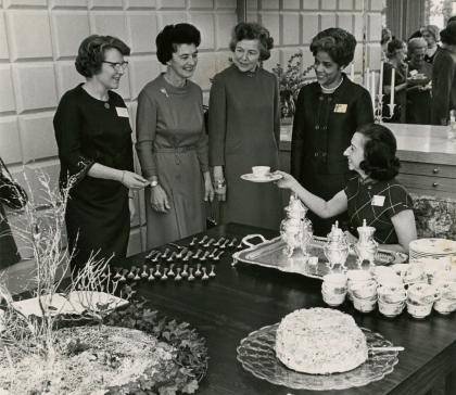 Members of the Duke Campus Club at a tea party in University House in January, 1969. Pictured, from left, are Mrs. Thomas D. Kinney, president of the Campus Club, Mrs. Richard L. Predmore, Mrs. Deryl Hart, Dr. Gwendolyn Newkirk of North Carolina College,