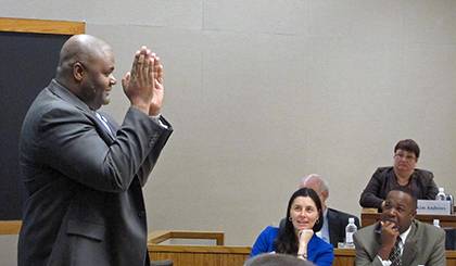 Joe Manhertz, executive director for Athletics Development office, reminds his Duke Leadership Academy classmates to look at the big picture during his graduation remarks. Photo by Marsha A. Green.