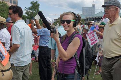 Jenny Morgan records audio during the Moral Mondays movement in Raleigh in 2013. Photo by Phil Fonville