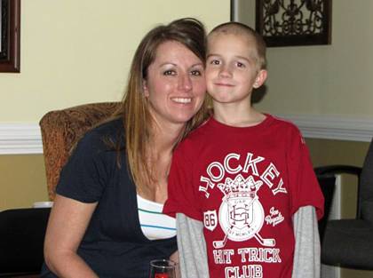 Sarah Gullie with her 10-year-old hockey-loving son, Shane. Photo courtesy of Sarah Gullie.