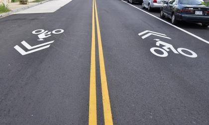 Duke is adding sharrows - symbols that alert drivers to share the road with bicyclists - to campus roads. Photo by Eric Gililland via Flickr.