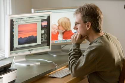 Allen Creech, an IT analyst for the Center for Documentary Studies, uses online tutorials at Lynda.com to sharpen his skills. Photo by Duke University Photography, originally published in 2010..
