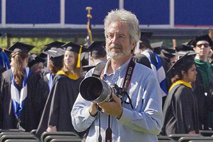 Les Todd on both sides of the camera at Duke's commencement in 2013. Photo courtesy of Duke University Photography.