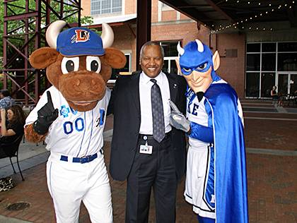 Phail Wynn with mascots from his two favorite places. Photo courtesy of Phail Wynn.