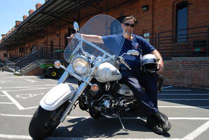 Don Watt, a general maintenance mechanic with Facilities Management, bought a motorcycle with money saved from quitting smoking. Photo by Bryan Roth.