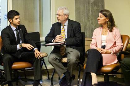 Student Lucas Metropulos, DukeEngage director Eric Mlyn and Melinda Gates talk about civic engagement as part of a series of conversations she held with students and other during Commencement weekend. Photo by Duke University Photography