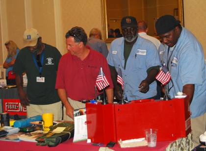 Members of Duke's Facilities Management Department check out products during the 2010 Safety Fair.