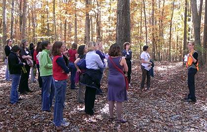 Sara Childs, at right, leads a tour group through Duke Forest. Beginning April 1, Childs will act as director of the Forest. Photo courtesy of Sara Childs.
