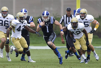 Quarterback Thomas Sirk takes off on a run against last week's opponent, Georgia Tech. Duke employees can cheer on the Blue Devils for just $5 this weekend, when they host Boston College. Photo by Duke Photography.