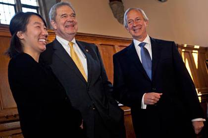 Duke student Yi Zhang, Duke Endowment chair Neil Williams and Duke President Richard Brodhead share a light moment at the conclusion of an event announcing an $80 million gift to the university to renovate West Union, Page and Baldwin Auditoriums. Photo 