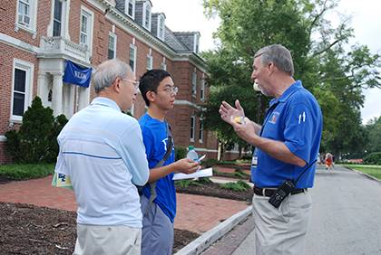 David Williams, crime prevention manager with Duke Police, spent this week's move-in day chatting with new students and parents. It was one way of outreach for Duke Police to introduce their staff and services to the class of 2018. Photo by Bryan Roth.