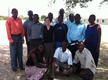 Eve Puffer, center, poses with members of her research team in Kenya. Puffer works to promote child mental health and family wellbeing, as well as HIV prevention.