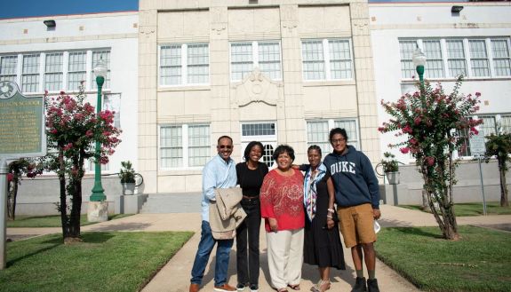 Mississippi Delta National Heritage Area Director Rolando Herts; Duke Robertson Scholar Jenna Smith; Reena Evers-Everette; Chaunté Smith; and Duke Robertson Scholar Vishal Jammulapati, in Jackson, Mississippi, pose outside the Smith Robertson Museum and Cultural Center. Smith and Jammulapati spent summer 2022 documenting Civil Rights history for the Mississippi Delta National Heritage Area. Photo courtesy of Vishal Jammulapati.