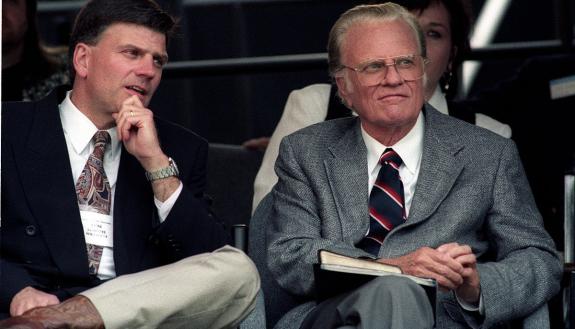 Billy Graham with son Franklin, 1994. Photo by Paul M. Walsh