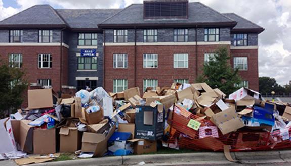 "Fort Duke" will be created from about 3,500 cardboard boxes collected during student move-in, like this giant pile of boxes saved outside Bell Tower on East Campus. Photo by Bryan Roth.