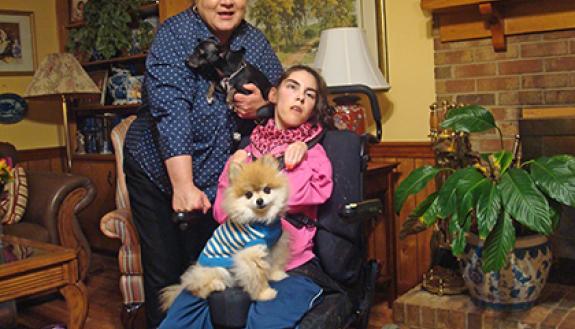 Ellen Robinson and her daughter, Ashley, foster dogs such as Bidawee, a black Chihuahua, and Beanie, a Pomeranian. Photo courtesy of Ellen Robinson.