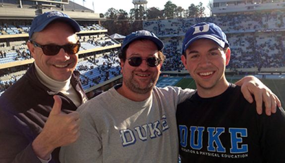 Karl Bates, left, regularly joins Keith Lawrence, middle, and his son, Eric, at Duke football games. They made the trip to Chapel Hill last weekend to see Duke beat the Tar Heels and capture the ACC Coastal Division crown. Photo courtesy of Keith Lawrenc