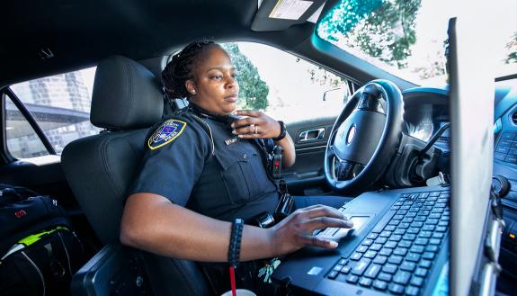 Sgt. Whitney McKoy of the Duke University Police Department patrols campus on a recent afternoon.