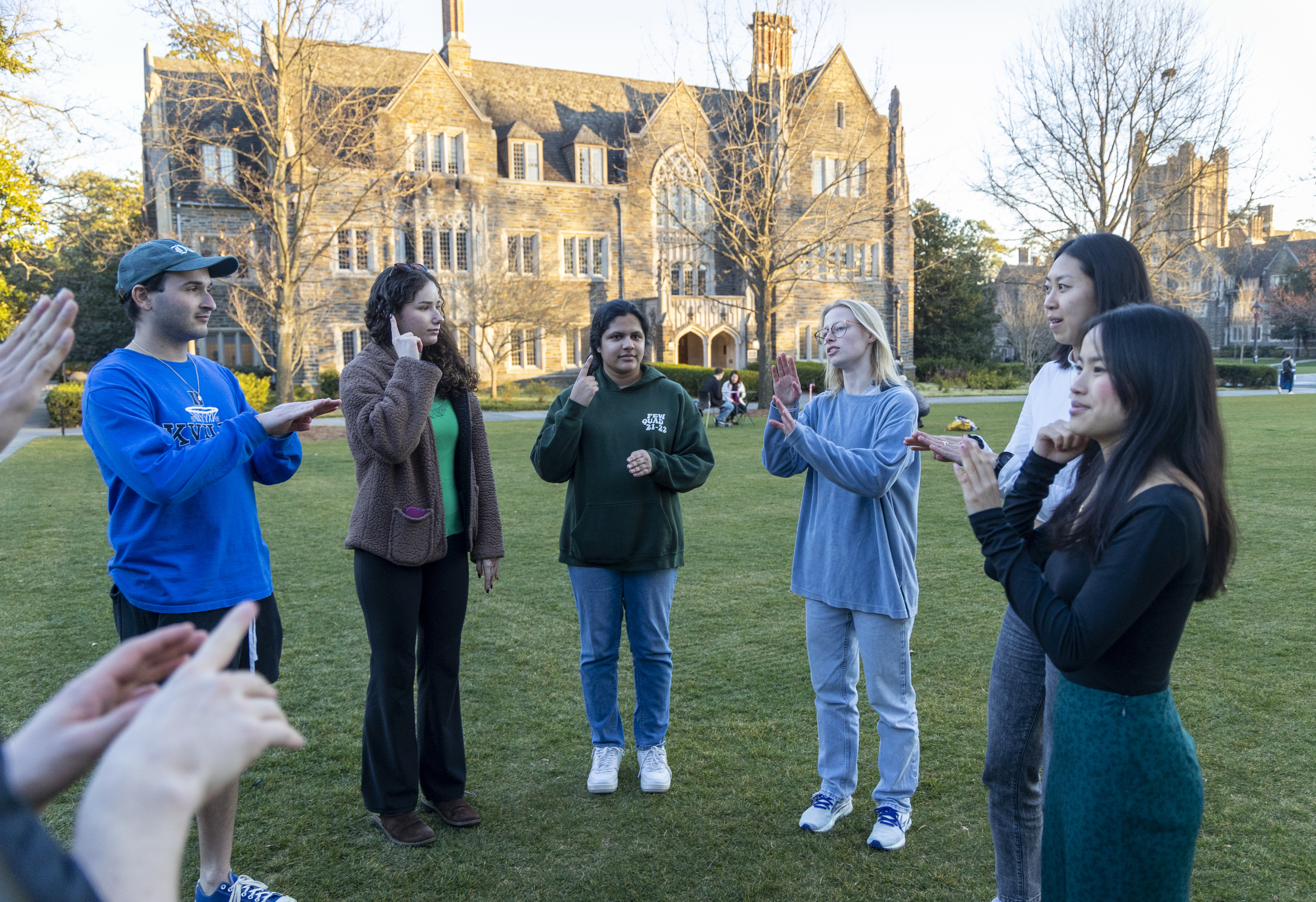 Duke ASL (American Sign Language) club executives lead a Sign-In on the Quad event on the Abele Quad