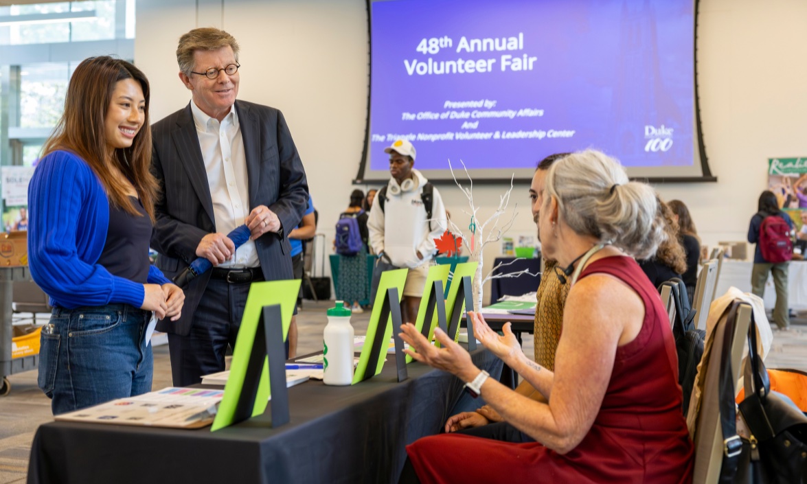 Duke President Vincent Price talks to representatives at one of the more than 50 organizations at the 48th Annual Volunteer Fair at Duke.