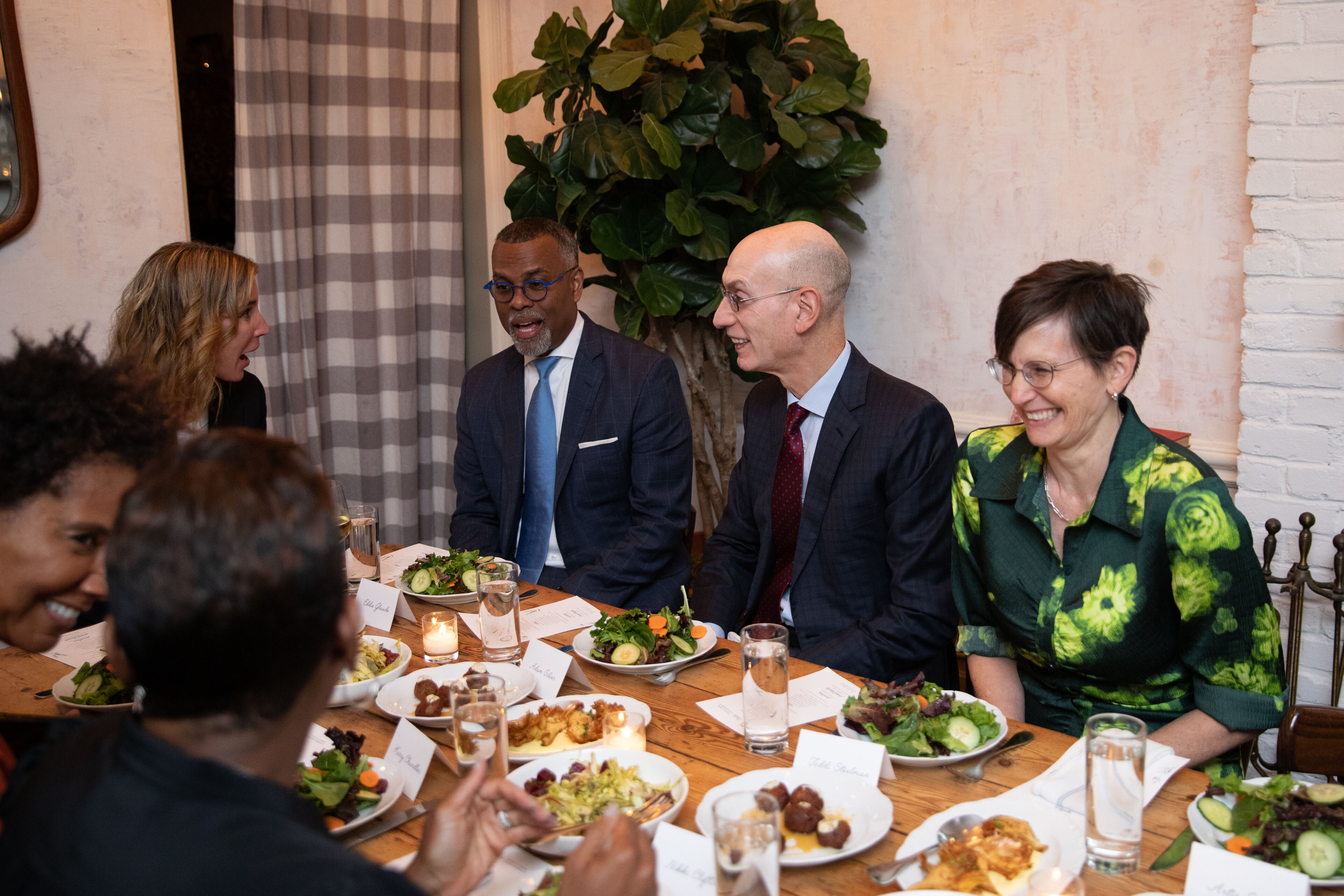 Toddi Steelman, Adam Silver, Eddie Glaude, Alysia Steinmann at a restaurant dinner table at a SALA event in New York for Climate Week