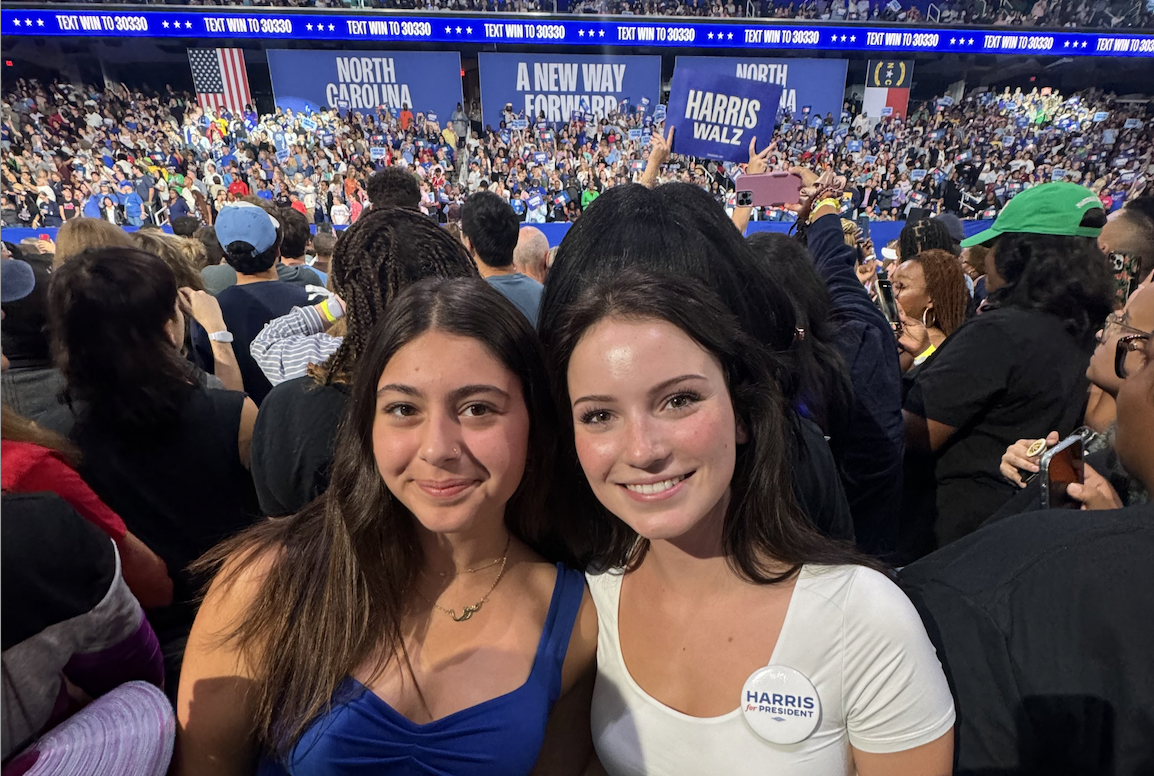 Two Duke students attend a Kamala Harris political rally.