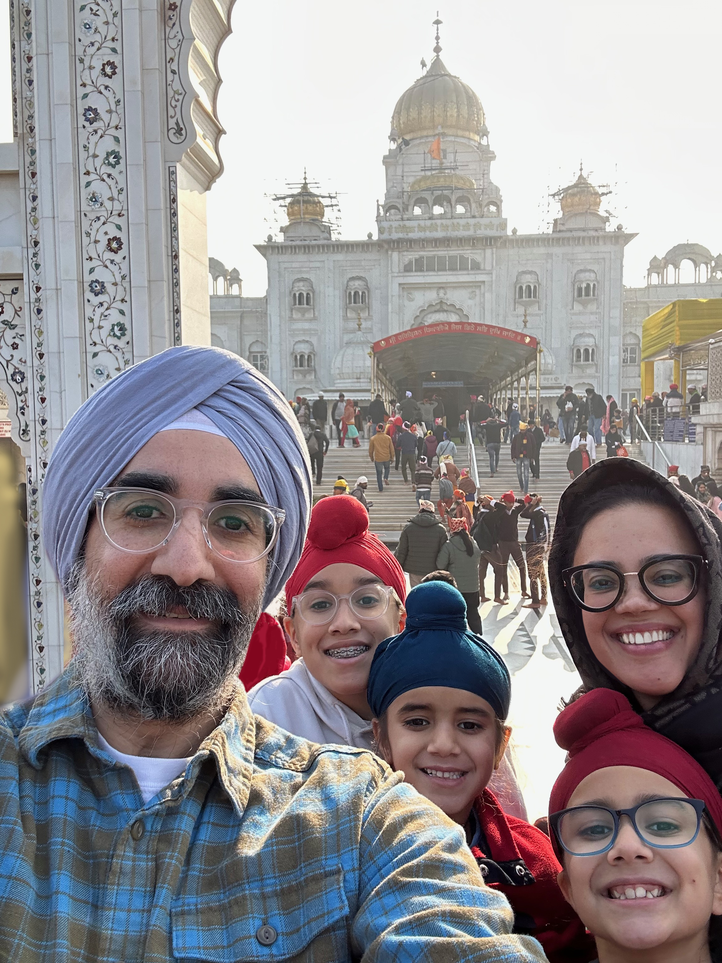 Ajay Kohli, left, poses with his family during a recent trip to India.