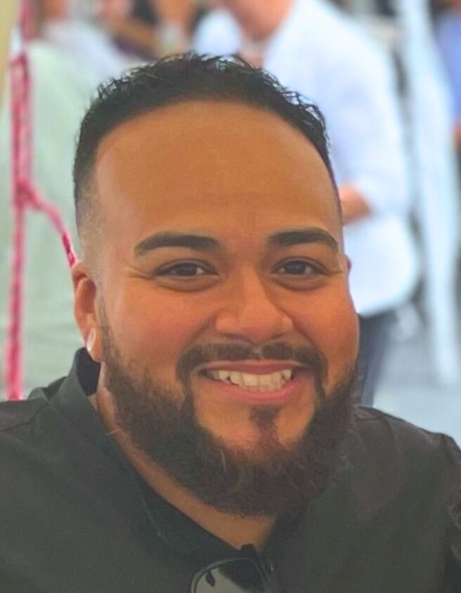 a head shot of Adriel Gonzalez