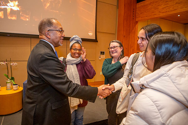 After the chat, the Rev. Dr. Benjamin F. Chavis, Jr. meets with, from left, Cameron Oglesby, Sanford ’23; Dr. Hannah Conway, assistant professor of environmental history; Artivista Karlin, first-year student; and Priscilla Kang, first-year student. Oglesby is working with Dr. Chavis on a book and an additional project about environmental justice.  