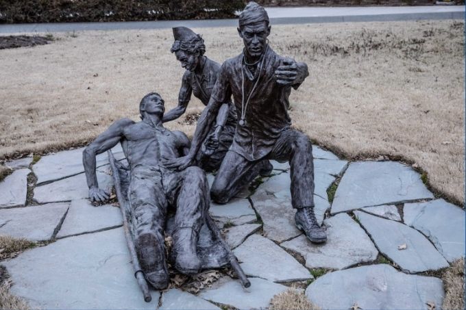 A sculpture was dedicated in 2002 near Duke Clinic “to honor the 65th, and all other men and women of Duke University Medical Center who have served our country in the armed forces.”