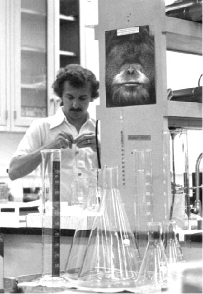 Assistant Professor Paul Modrich doing an experiment