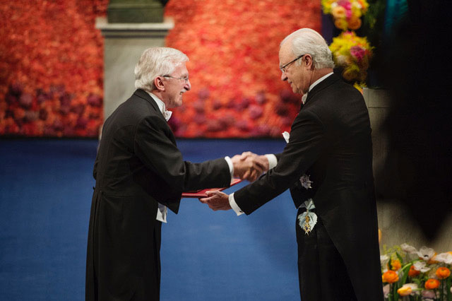 Receiving the Nobel Prize.