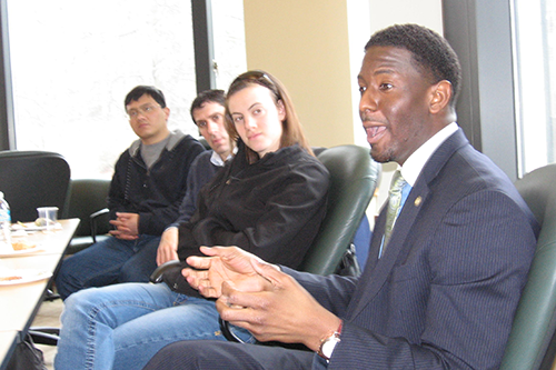Andrew Gillium with students at Duke in 2009
