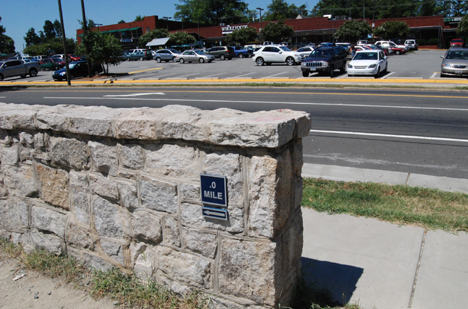 The marker across from Whole Foods notes the starting point for the new mileage signs. The marker across from Whole Foods notes the starting point for the new mileage signs.