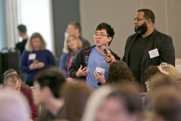A Duke student questions panelists during the provost forum. Photo by Megan Mendenhall