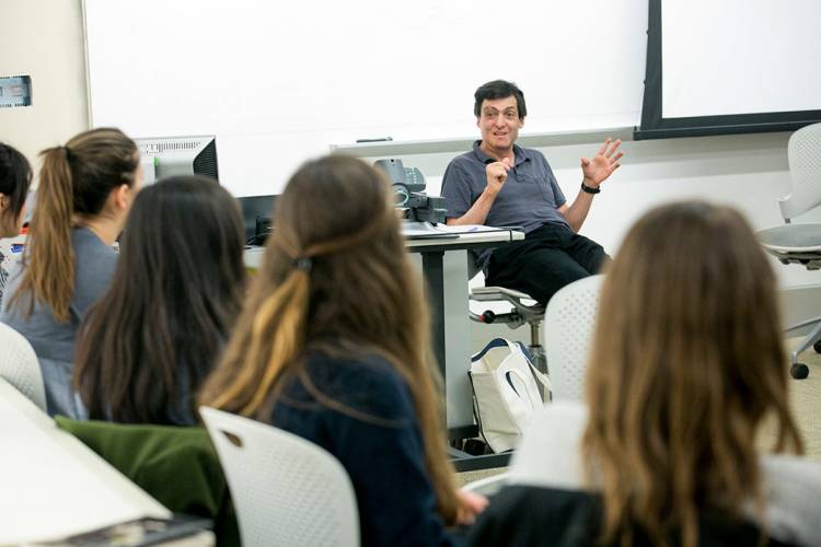 Dan Ariely and students conducted experiments and studied with a magician in their behavioral economics class. Photo by Megan Mendenhall/Duke Photography