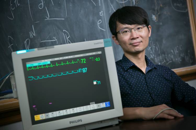 Where some see noisy spikes and dips on an electrocardiogram, Duke professor Hau-tieng Wu sees hidden mathematical problems. Photo by Megan Mendenhall, Duke Photography.