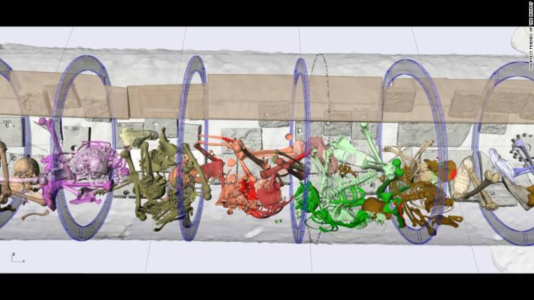 An x-ray reconstruction of the interior of the H.L.Hunley shows the color-coded skeletons of the eight crewmen still at their stations with no broken bones. (Friends of the Hunley)