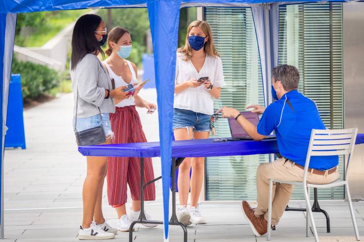 Students line up for testing at Penn Pavilion on the first day of move-in for the class of 2024.