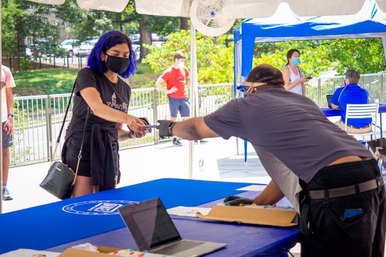 Students lined up for their Duke Cards on the first day of move-in for the class of 2024.