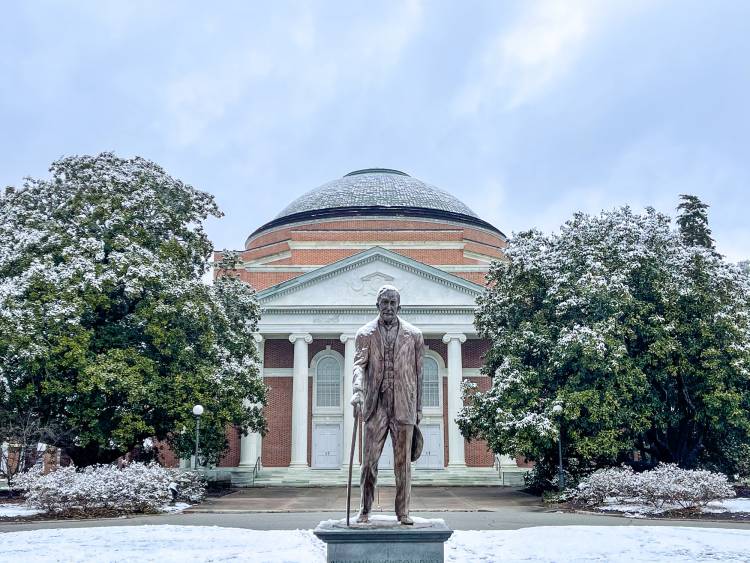 The Benjamin Duke statue, covered in a light dusting of snow.