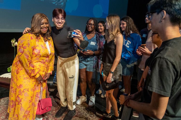 Retta meets with students after her talk.