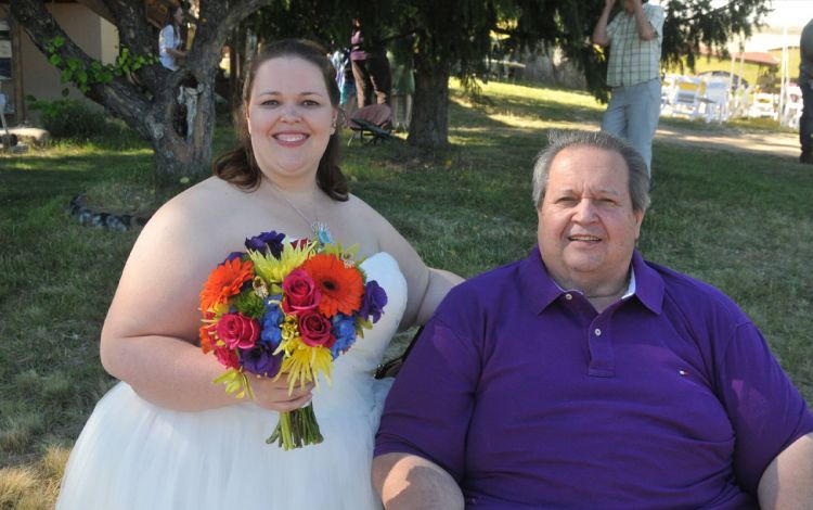 Leah Austin, left, stands next to her father, Allan, on her wedding day. Photo courtesy of Leah Austin.