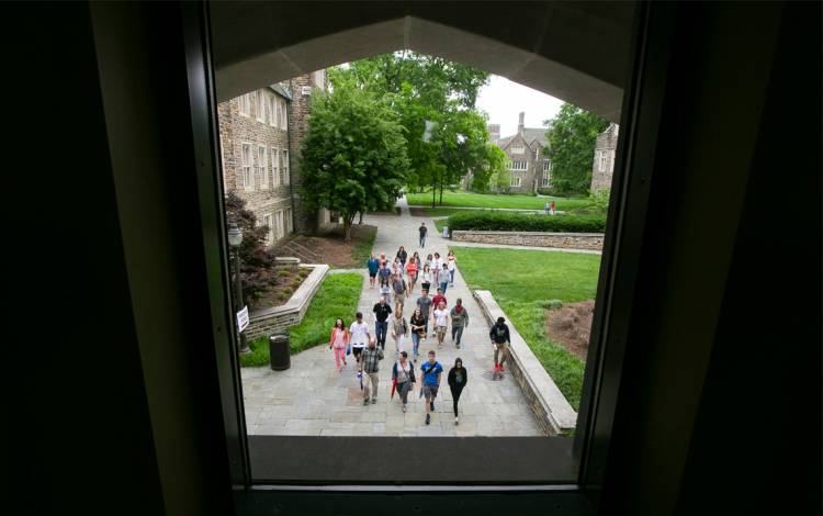 Students walking on Duke's campus.