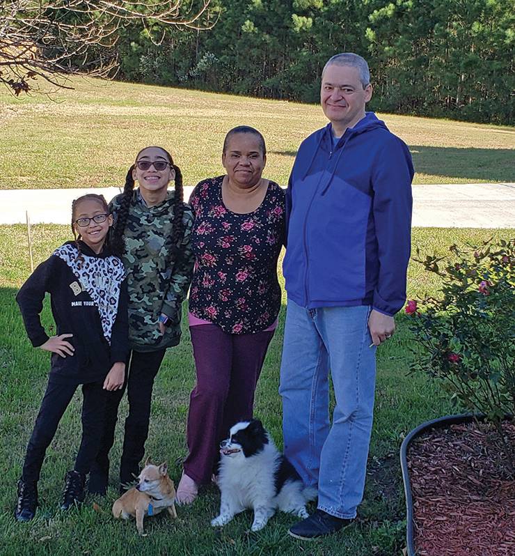 Aguedo Cordero, right, with his wife, granddaughters and dogs. Photo courtesy of Aguedo Cordero.