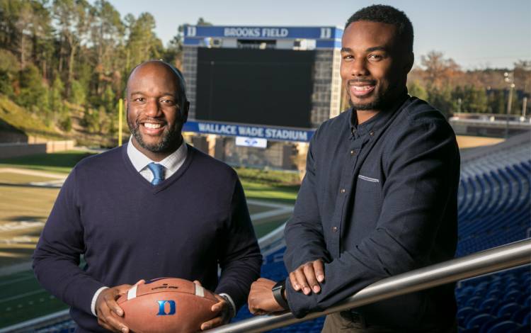 Troy Austin, left, and DeVon Edwards, right, have gone from leading Duke on the football field to supporting the Blue Devils through positions in athletics administration.