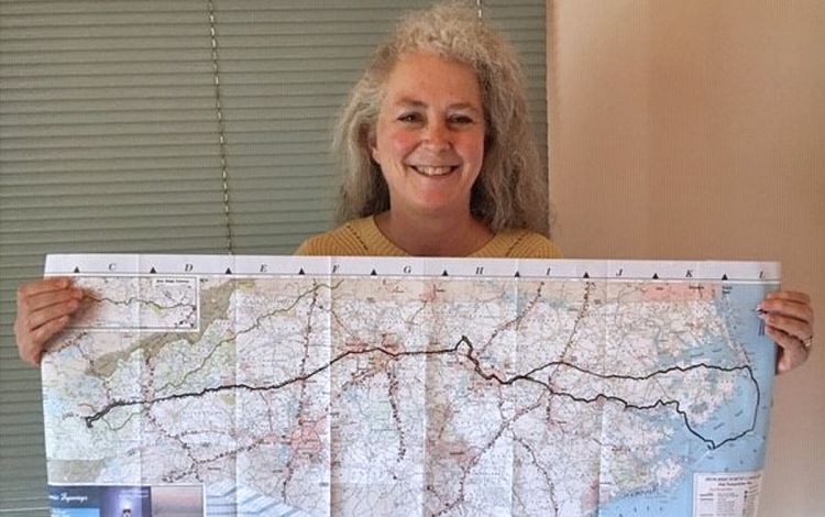 Lora Griffiths shows of one of the many maps showing her virtual journey walking across the state and back each year. Photo courtesy of Lora Griffiths.