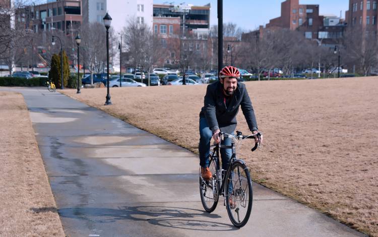 Jeremy Thornhill travels about 1.5 miles from his Durham home to the OIT office at the American Tobacco Campus.