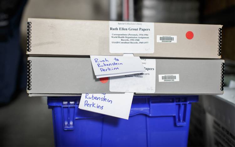 Boxes of materials wait to be shipped to campus. Photo by Alex Boerner.